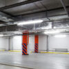 Batten lights illuminating an underground carpark